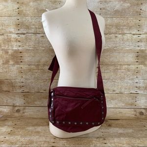 Burgundy Nine West studded nylon bag